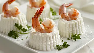 photo of a catfish and crawfish tails on a cream cheese mold