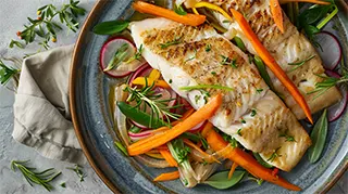 photo of english style catfish with root vegetables