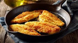 photo of delicious fried tilapia fillets coated in cornmeal