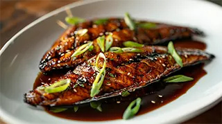 photo of smokey broiled catfish with glossy soy glaze
