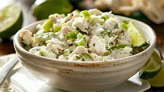 photo of a delicious Wahoo salad with chopped fresh onions and green peppers