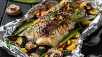 photo of a baked sea bass with teriyaki vegetables