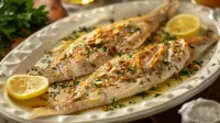 photo of classic sea bass almondine with golden slivered almonds