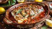 photo of greek style sea bass with rich tomato sauce and mediterranean herbs